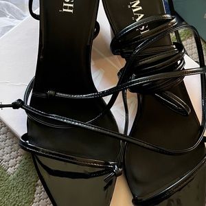 Brand new never worn lace up sandals.